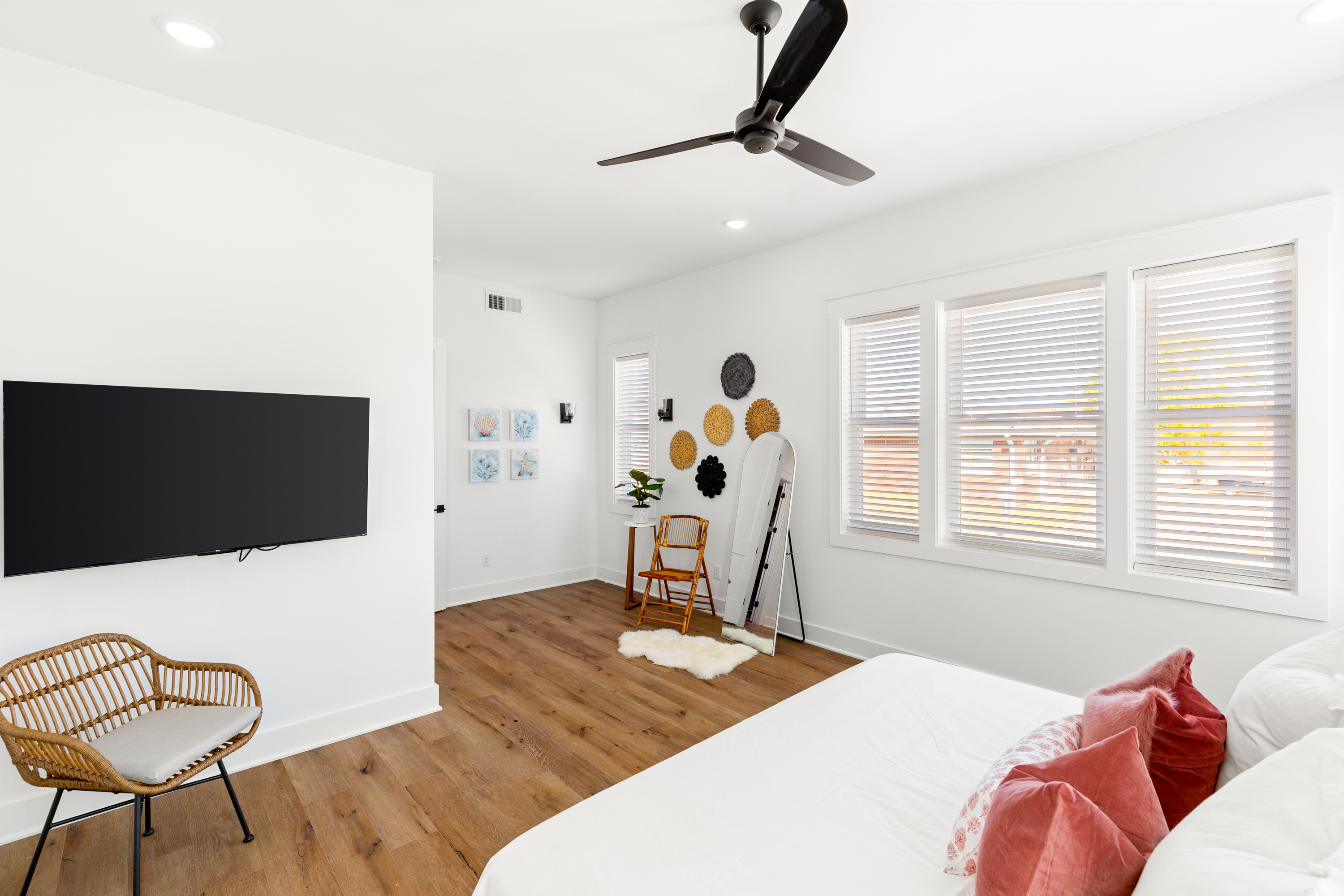 Cozy bedroom featuring wicker furniture and soft lighting